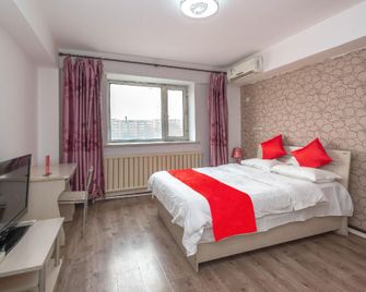 Meirishun Hotel Apartment (Harbin University of Traditional Chinese Medicine) - هاربين - غرفة نوم