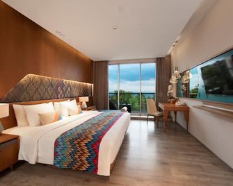 Aruna Senggigi Resort & Convention - Senggigi - חדר שינה