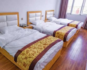 Huayao Hotel - Nanyang - Bedroom
