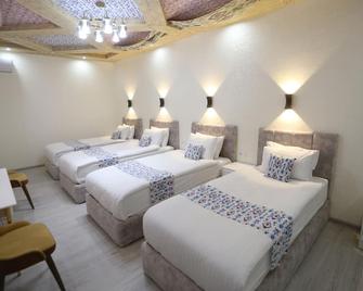 Bibihoja Hotel - Xiva - Slaapkamer