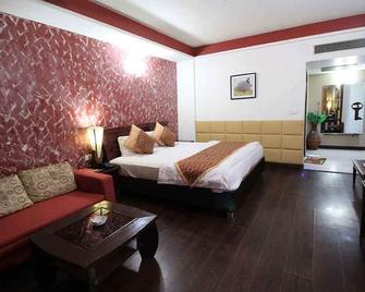 Hotel The Pearl - 昌迪加爾 - 臥室