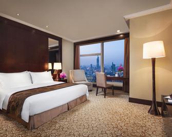 جولدن إيجل سميت هوتل (داون تاون) - نانجينغ - غرفة نوم