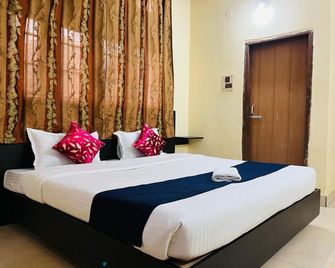 Hotel Cosy Home - Guwahati - Camera da letto