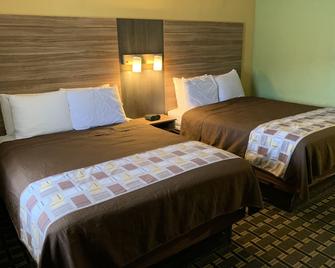 يونيفيرسيتي مانور إن - بوفالو - غرفة نوم