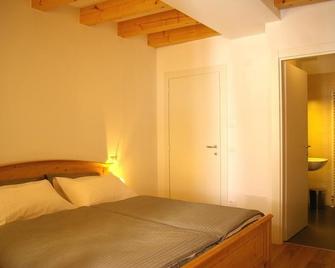 Trentino Apartments - Il Gufo Vacanze - Borgo Valsugana - Camera da letto