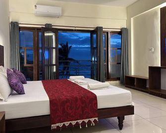 The Ocean Park Beach Resort - טריבאנדרום - חדר שינה