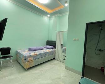 OYO 93664 Homestay Purirano - Kendari - Schlafzimmer