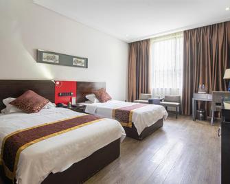 Xiangyang Rongting Guest House - Xiangyang - Bedroom