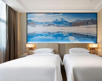 Vienna Hotel (Nanjing Maigao Bridge Subway Station Branch) - Nanjing - Bedroom