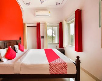 OYO Flagship 65920 Hotel Shree Daulatgarh - Udaipur - Schlafzimmer