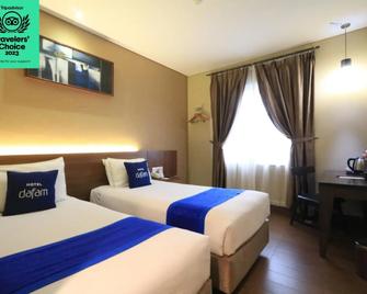 Dafam Hotel Cilacap - Cilacap - Schlafzimmer