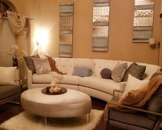 NOW accommodate misplaced families due to catastrophic events. Ins rep to book. - Spring - Living room