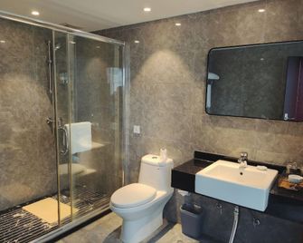 Fengyuan Hotel - Liangshan - Schlafzimmer