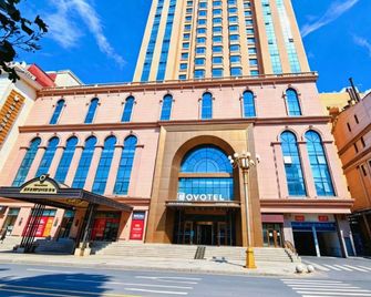 Manhattan Apartment Xixi Homestay (Harbin Central Street Branch) - Harbin - Building