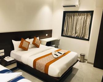 Hotel Flora Suites - Mumbai - Habitació
