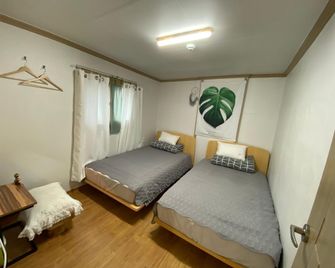 Saesori Guesthouse - Gangneung - Schlafzimmer
