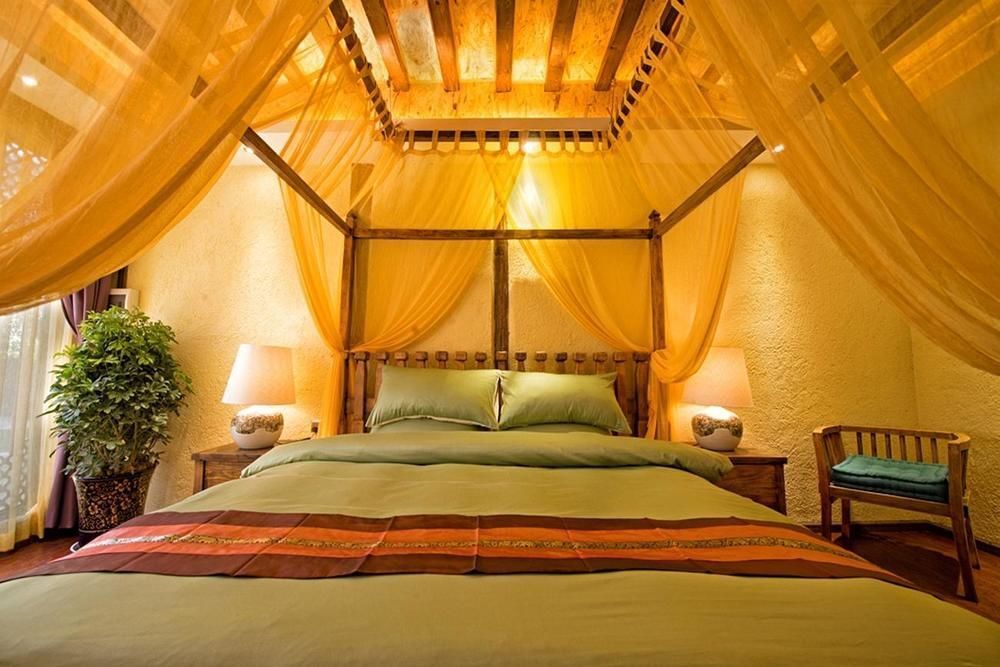 Ruijingna Boutique Inn - ליז'יאנג - חדר שינה