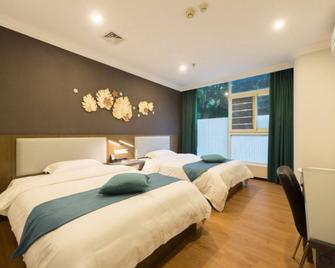 Huiyin Fashion Hotel - Canton - Chambre