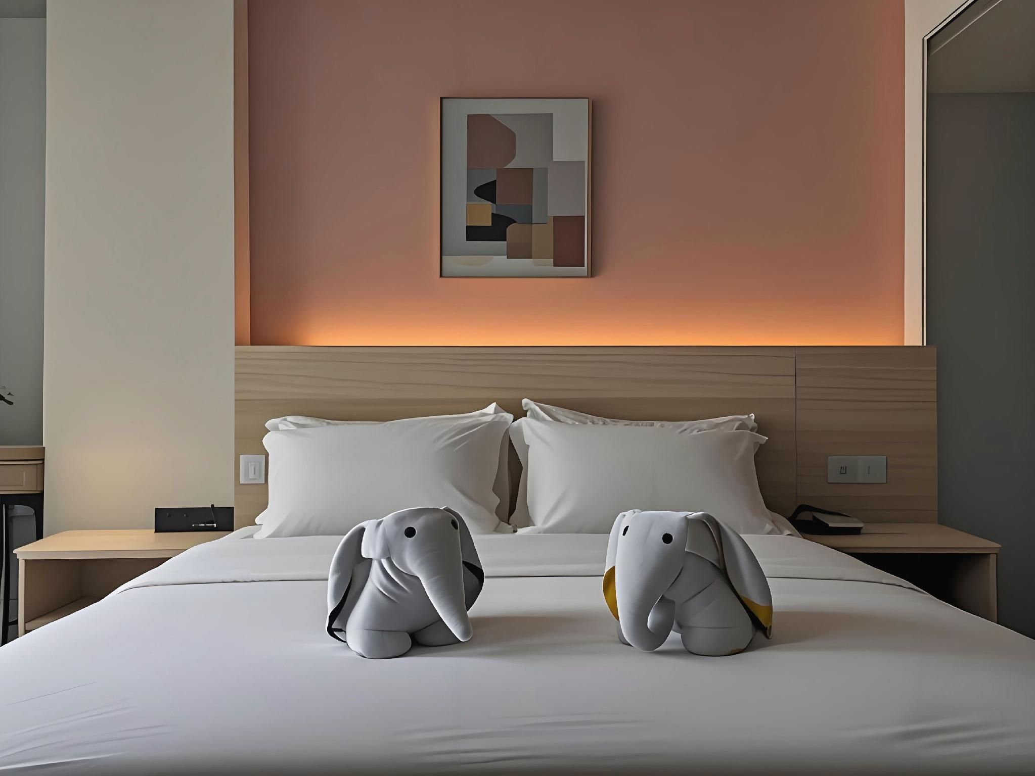 Jiajie Hotel (Haikou Qilou Old Street) - האיקואו - חדר שינה