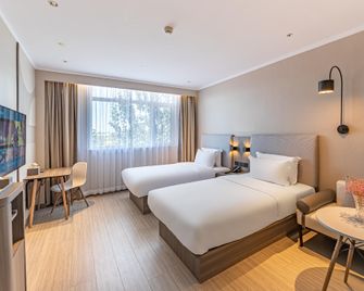 Hanting Hotel (Tianjin Beichen Development Zone Gaoxin Avenue) - Tianjín - Habitación
