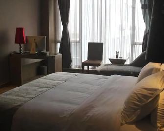 Nanqiao Fengshang Hotel - Deyang - Habitación
