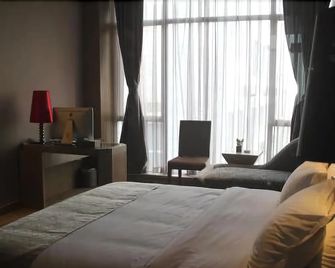 Nanqiao Fengshang Hotel - Deyang - Bedroom