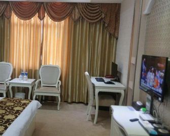 Kunming Baolilai Hotel Changshui Airport Branch - Kunming - Habitación