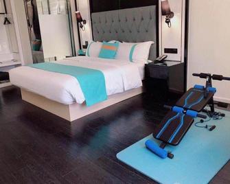 Xana Hotelle Neijiang City Center Branch - Neijiang - Camera da letto
