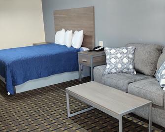 Economy Inn Motel - Orange - Bedroom