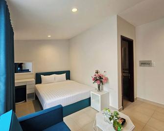 Song Hung 1 Luxury Hotel & Apartments - Ciudad Ho Chi Minh - Habitación