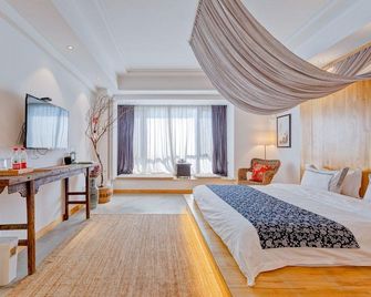 Xi'an Hanshe Inn Daming Palace Wanda Branch - Xi'an - Bedroom