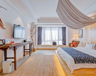 Xi'an Hanshe Inn Daming Palace Wanda Branch - Xi'an - Schlafzimmer