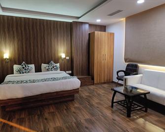 The Dwelling Paradise - Greater Noida - Bedroom