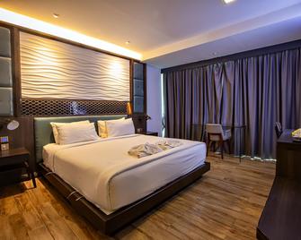 Holatel Hotel Phitsanulok - Phitsanulok - Habitación
