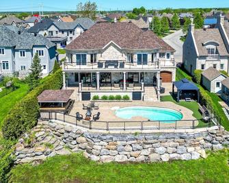 Resort-Like Amenities: Pool, Gym, Hot Tub, Front Water, Game Room, Cinema - Terrebonne - Building