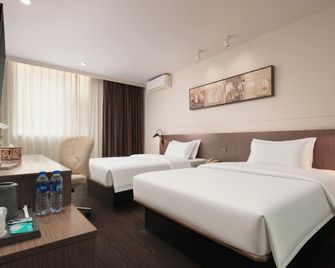 Jinjiang Inn Select Haikou Qilou Old Street Binhai Avenue - Haikou - Bedroom