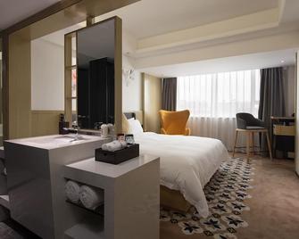 باكو هوتل جيانتيلو مترو برانش - غوانغزهو - غرفة نوم