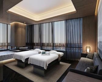 فور سيزونز هوتل داليان - داليان - غرفة نوم