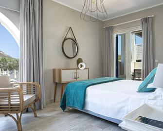 Les Sables Noirs & Spa - Vulcano - Schlafzimmer