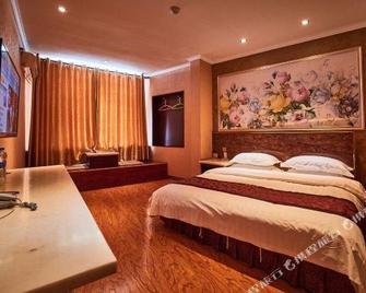 Liang Mao Hotel - Zhangye - Schlafzimmer