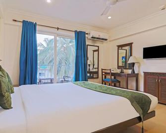 Treebo Premium Dona Eliza, 700 metres from Calangute Beach - Calangute - Bedroom