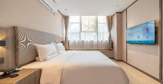 Hanting Hotel Shanghai Hongqiao Airport - Shanghai - Schlafzimmer