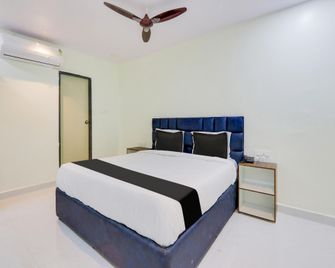 Collection O Sri Narmada Grand - Warangal - Bedroom