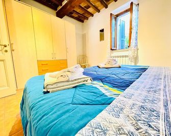 Tempietto Cozy Apartment near the Historic Center - Perugia - Schlafzimmer