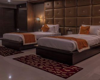 Hotel Heavens Park - Bilāspur - Bedroom