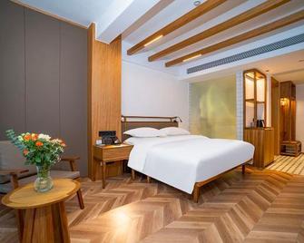 Liangju Hotel - Mianyang - Bedroom