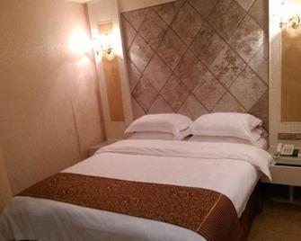 Shishi Wanjia Oriental Hotel - Quanzhou - Bedroom