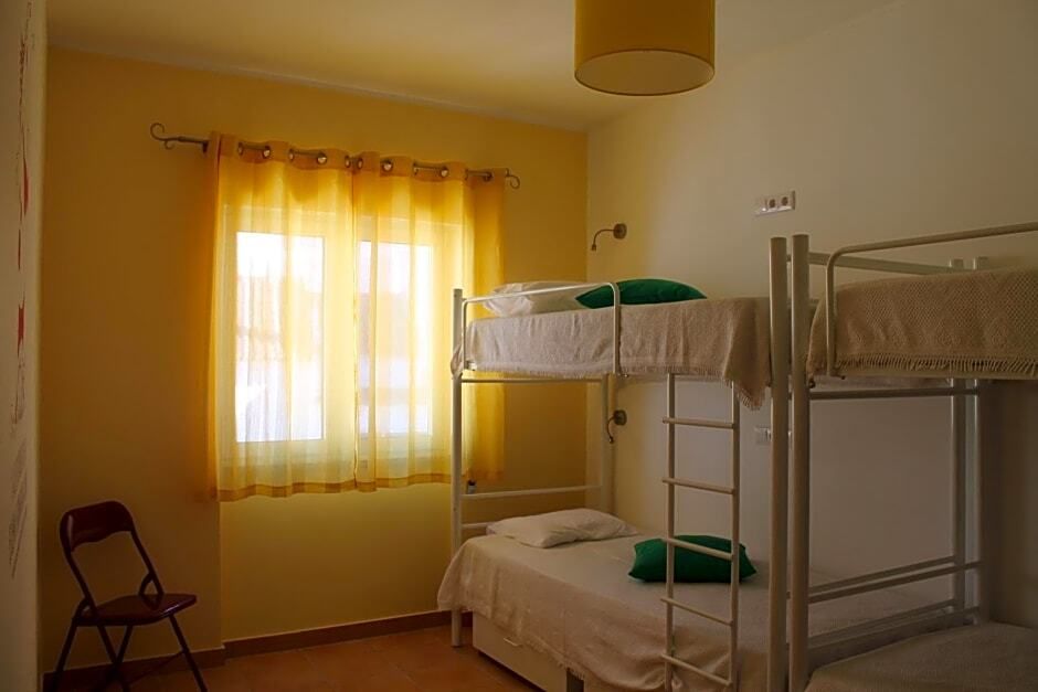 Racing Mackerel Hostel - לאגוס - חדר שינה