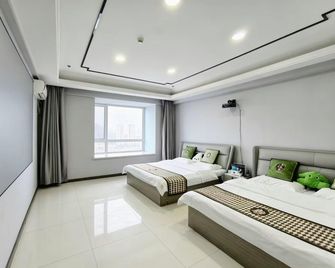Yijia Cinema-Style B&B (Andong Old Street Branch) - Dandong - Ložnice