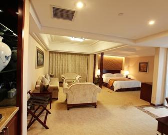 Qilu International Hotel - Harbin - Schlafzimmer